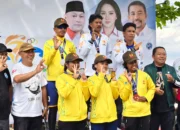 Atlet selam Halmahera Selatan, M. Ela H Iskandar, saat berhasil mengamankan medali emas pada nomor Orientasi Bawah Air (OBA) putra dalam Porprov V Malut di Pantai Pitu, Halmahera Utara, Sabtu (13/6/2026).
